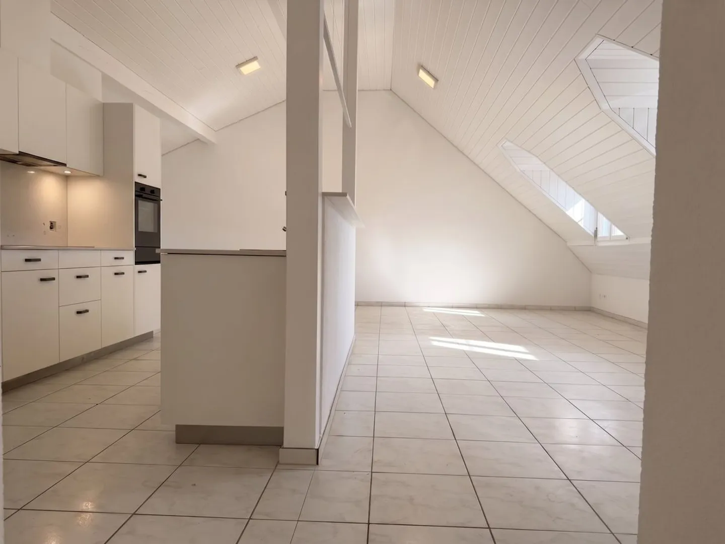 BRIGHT ATTIC APARTMENT WITH BRAND NEW KITCHEN - NOW CHF 100 CHEAPER! New: CHF 1,750/month (+ CHF 340 NK) - Photo 1 of 12