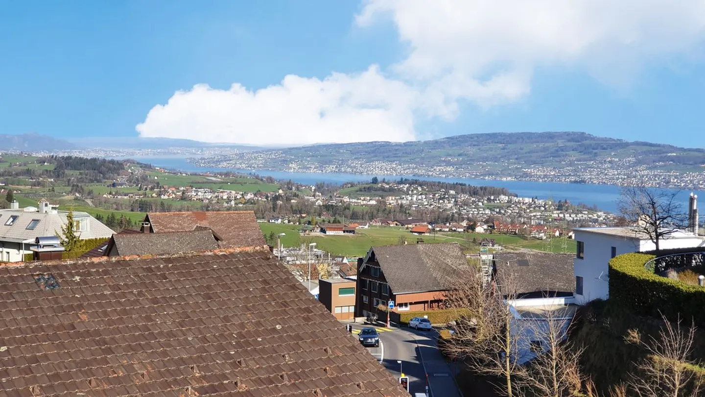 Attractive penthouse apartment with a magnificent view of Lake Zurich in Schindellegi - Photo 1 of 12