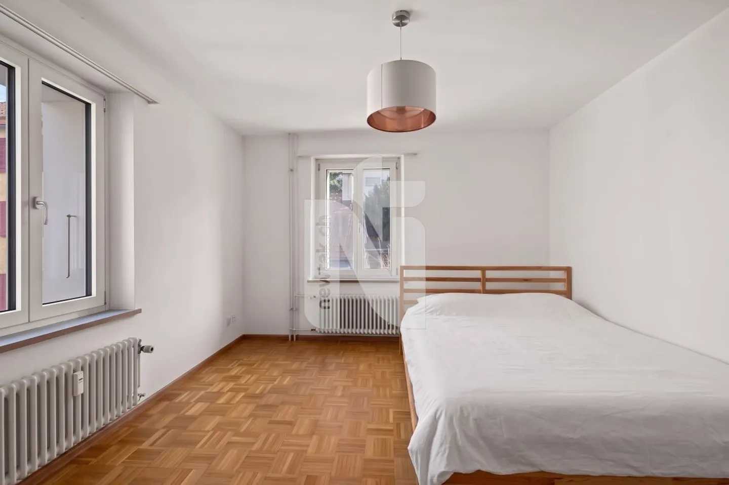 Attractive Yield Multi-Family House with Generous Living Units in Desirable Location in Binningen - Photo 10 of 13