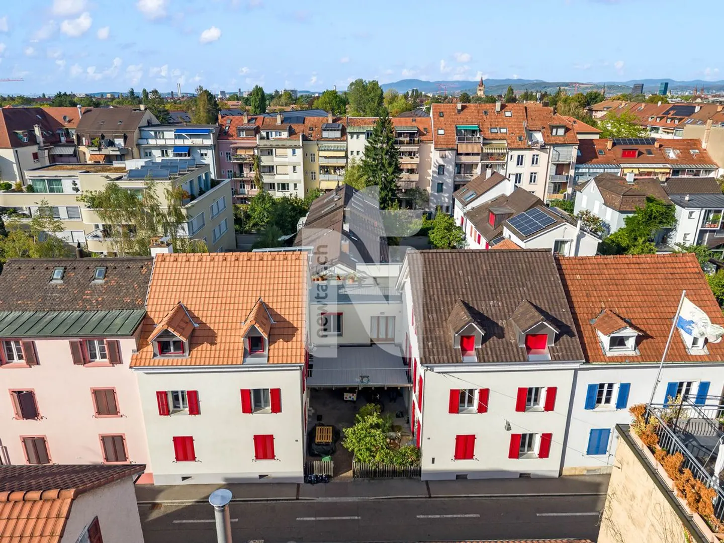Attractive Yield Multi-Family House with Generous Living Units in Desirable Location in Binningen - Photo 1 of 13