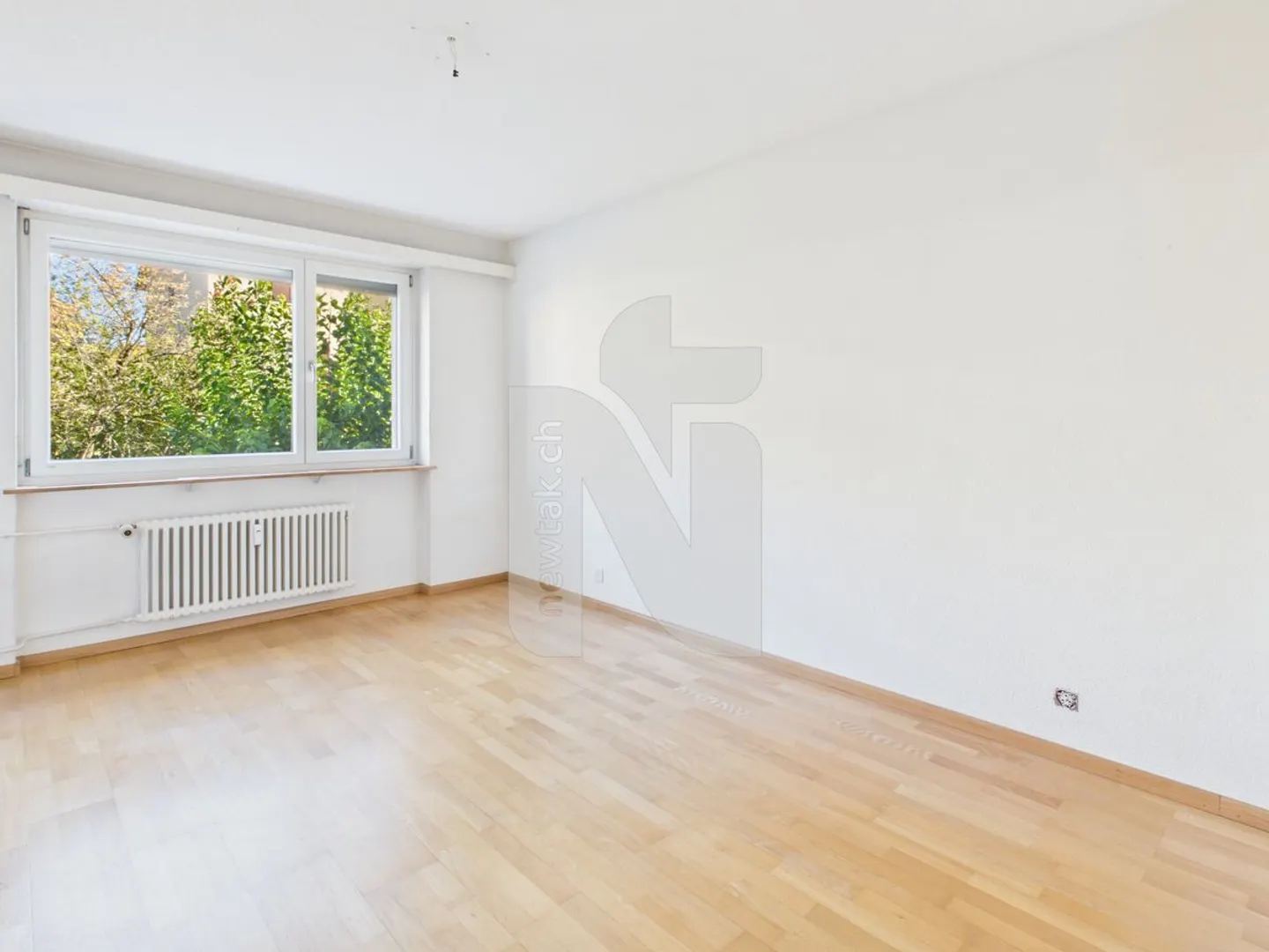 Appartement 5.5 pièces avec accès au jardin et garage privé - Photo 3 sur 12