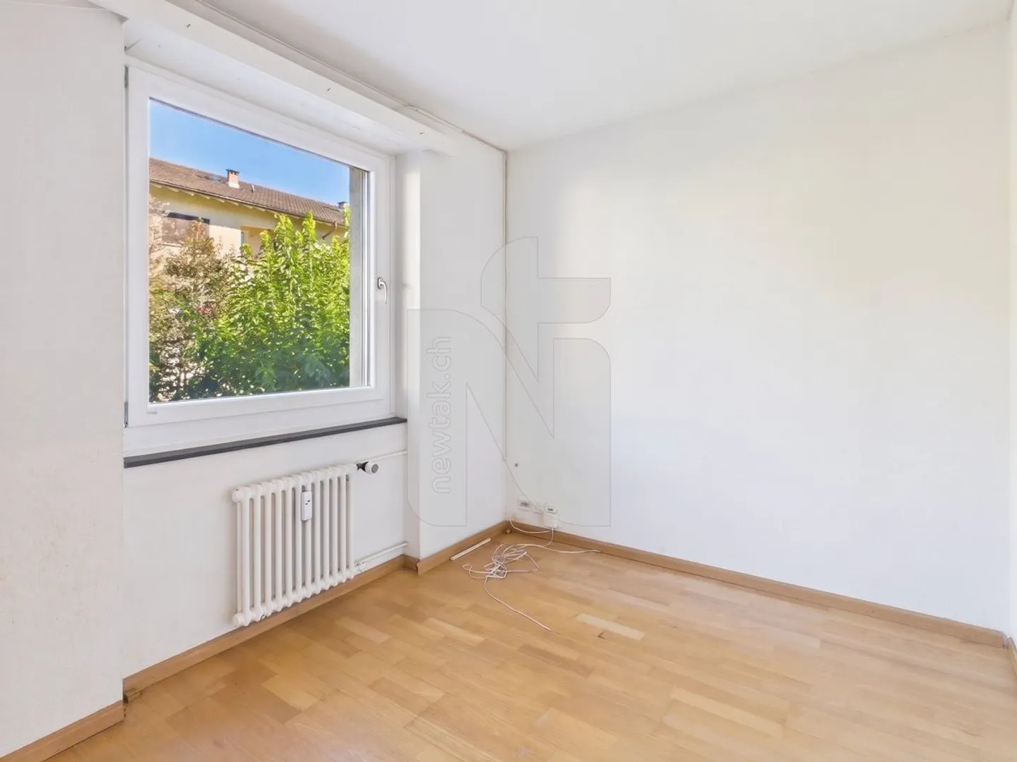 Appartement 5.5 pièces avec accès au jardin et garage privé - Photo 12 sur 12