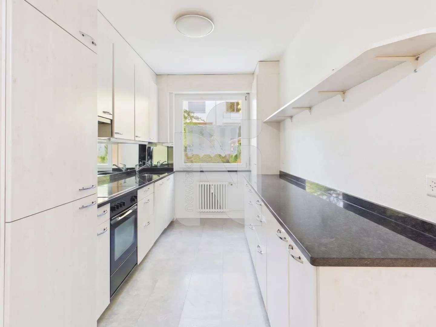 Appartement 5.5 pièces avec accès au jardin et garage privé - Photo 4 sur 12