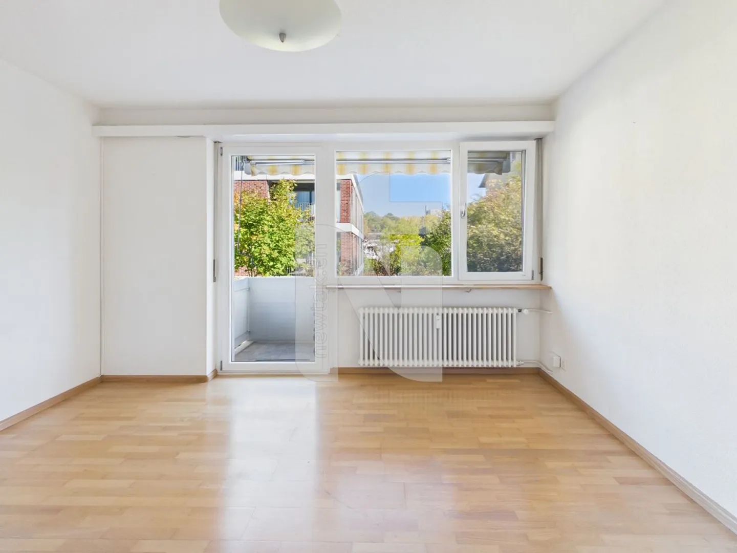Appartement 5.5 pièces avec accès au jardin et garage privé - Photo 5 sur 12