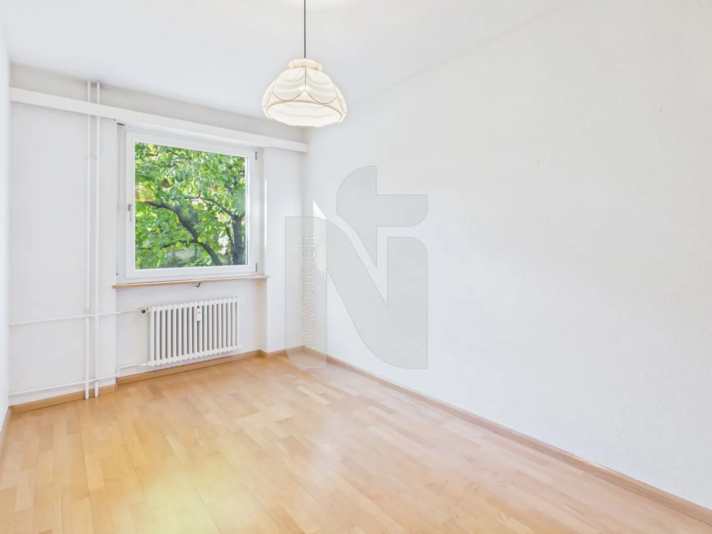 Appartement 5.5 pièces avec accès au jardin et garage privé - Photo 11 sur 12