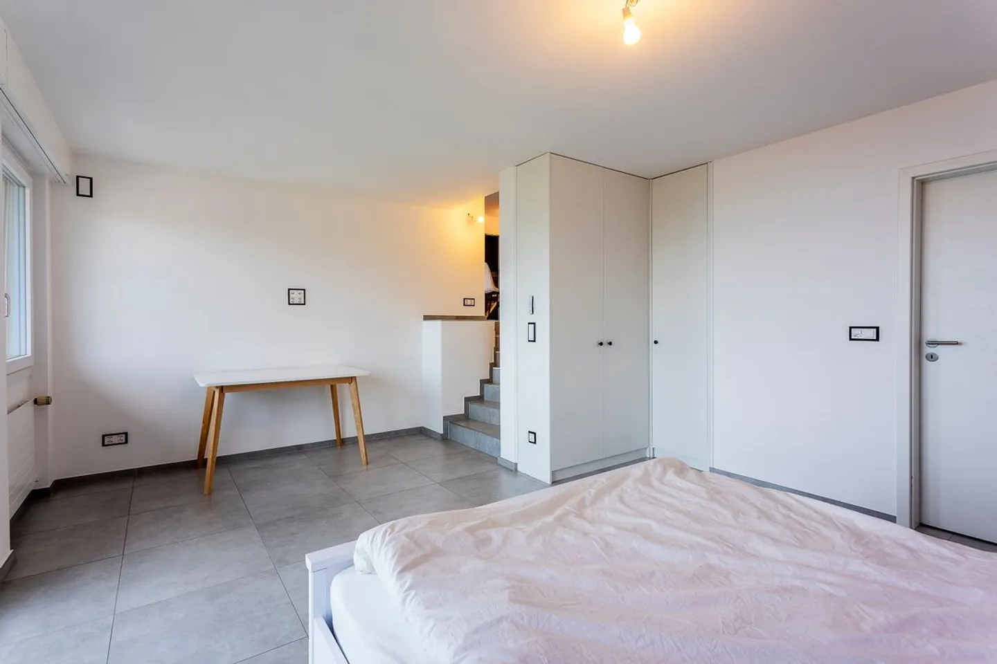 Superb 2.5-room duplex renovated with panoramic views of Lake Geneva, the Alps, and Lavaux - Photo 7 of 11