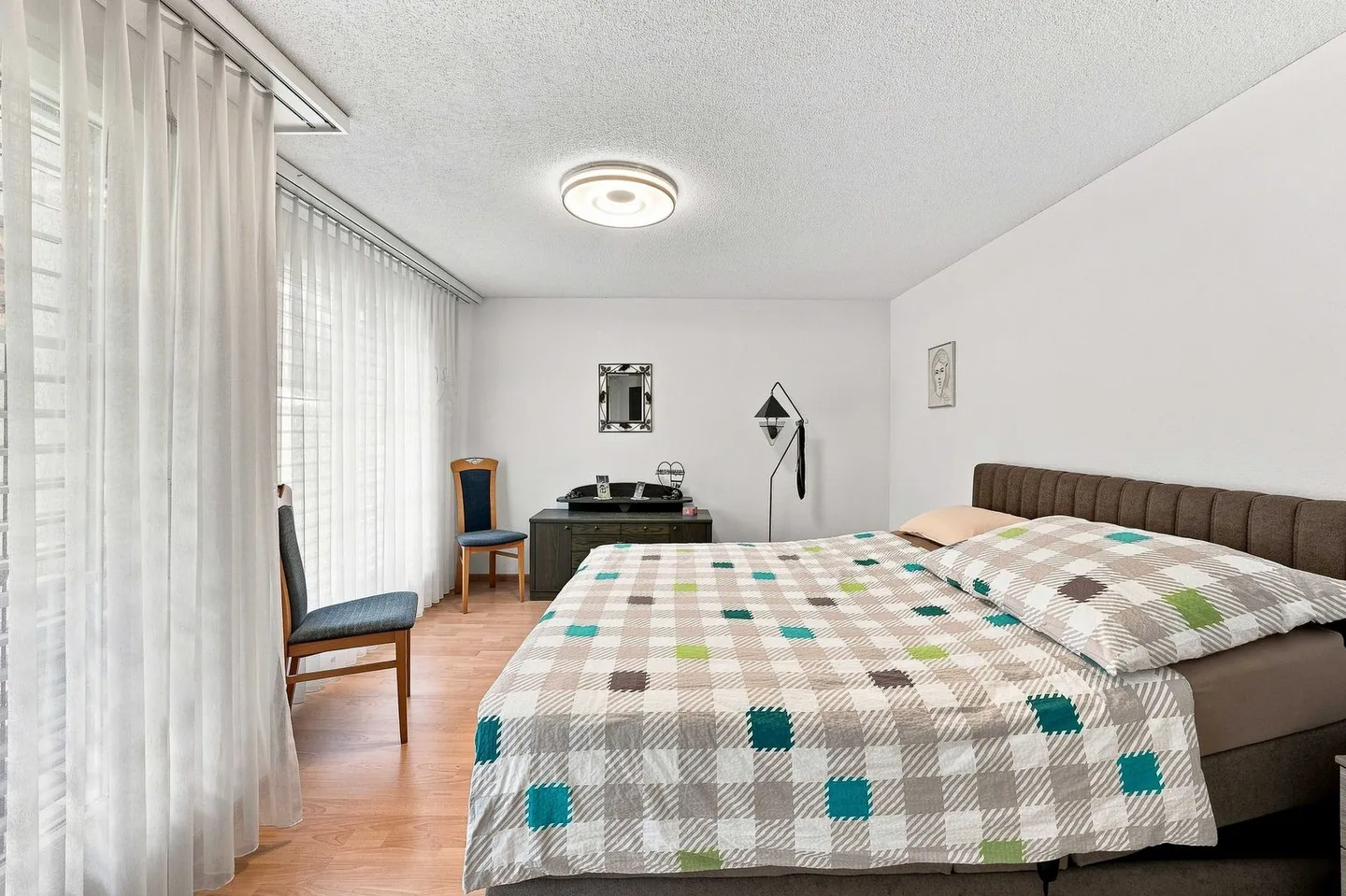 Vierfamilienhaus mit Baulandreserve - Foto 6 von 13