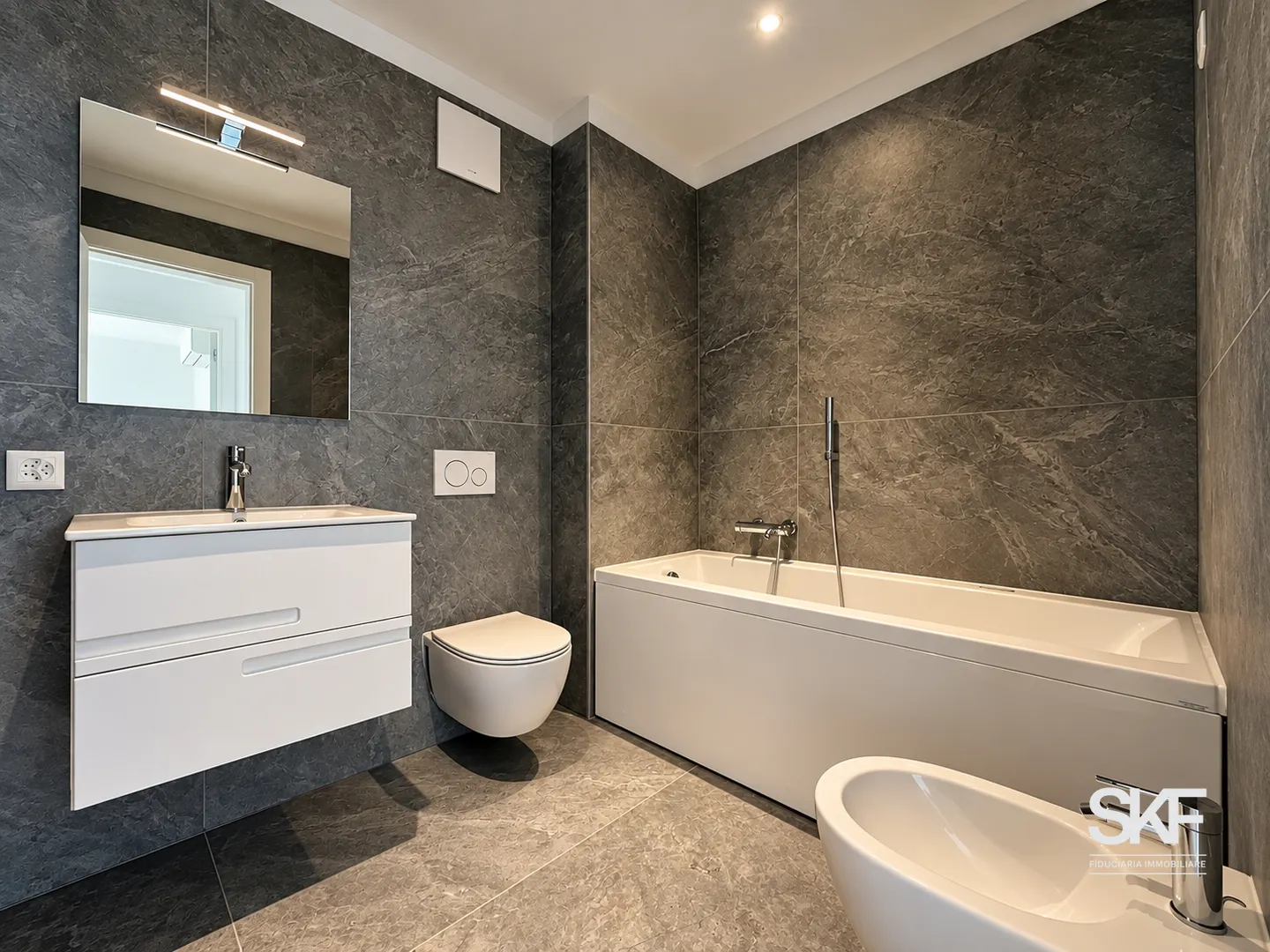 MASSAGNO - ZU VERKAUFEN NEUBAU-PENTHOUSE MIT TERRASSE UND SEEBLICK - Foto 9 von 13