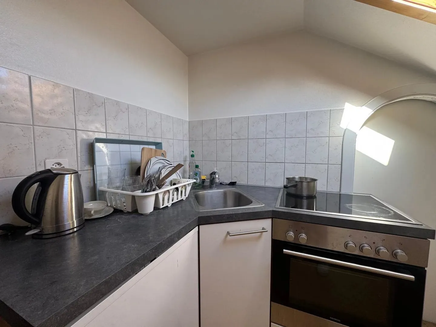 Charmant Appartement en Combles à Bulle - Photo 1 sur 8