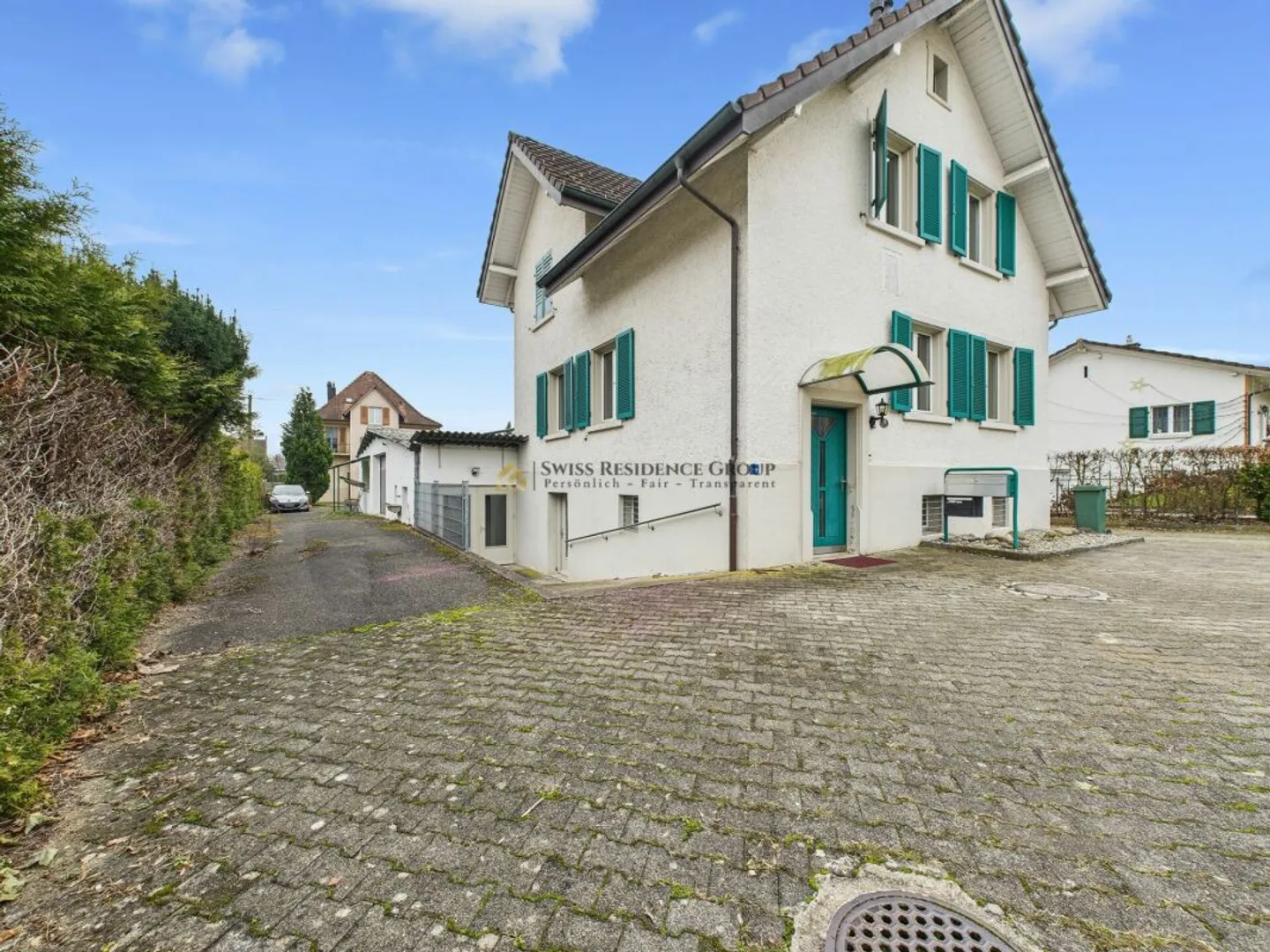 Vielfältiges Einfamilienhaus mit Gewerbemöglichkeit und Autolift - Foto 2 von 12