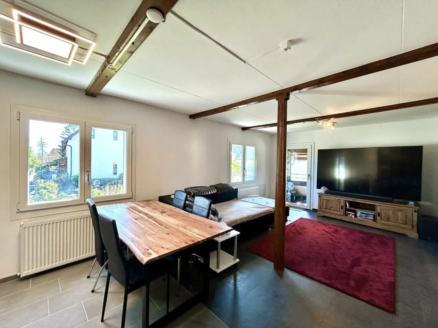 Completely renovated 4.5-room maisonette apartment with mountain view! - Photo 2 of 11