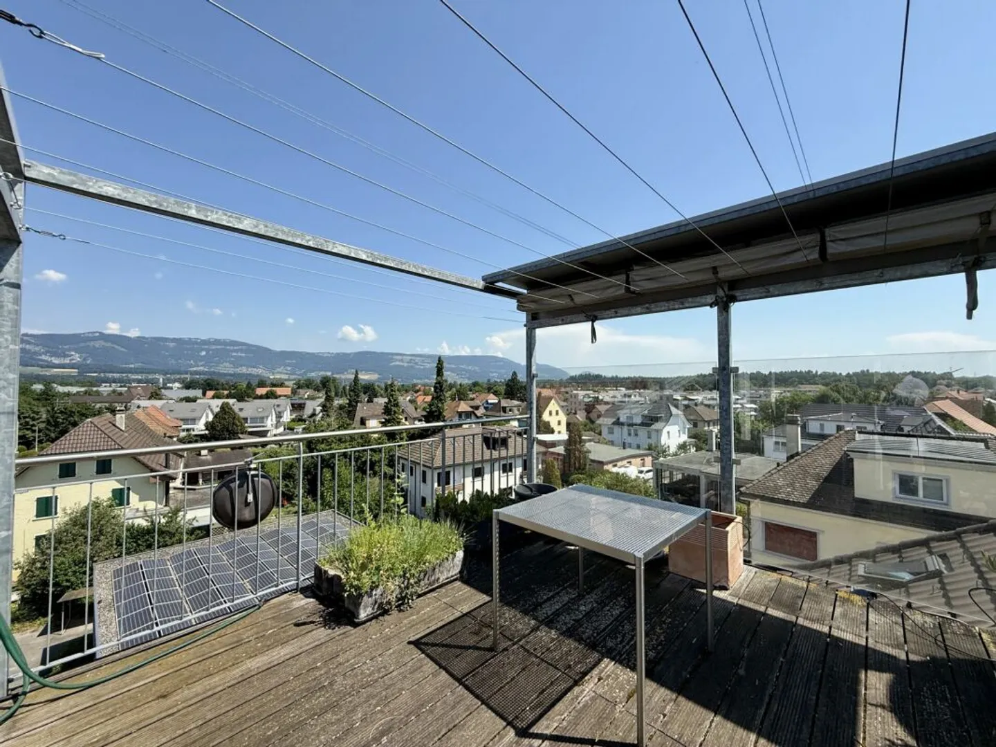 Multi-family house with commercial share and PV system in the core zone - Photo 11 of 13