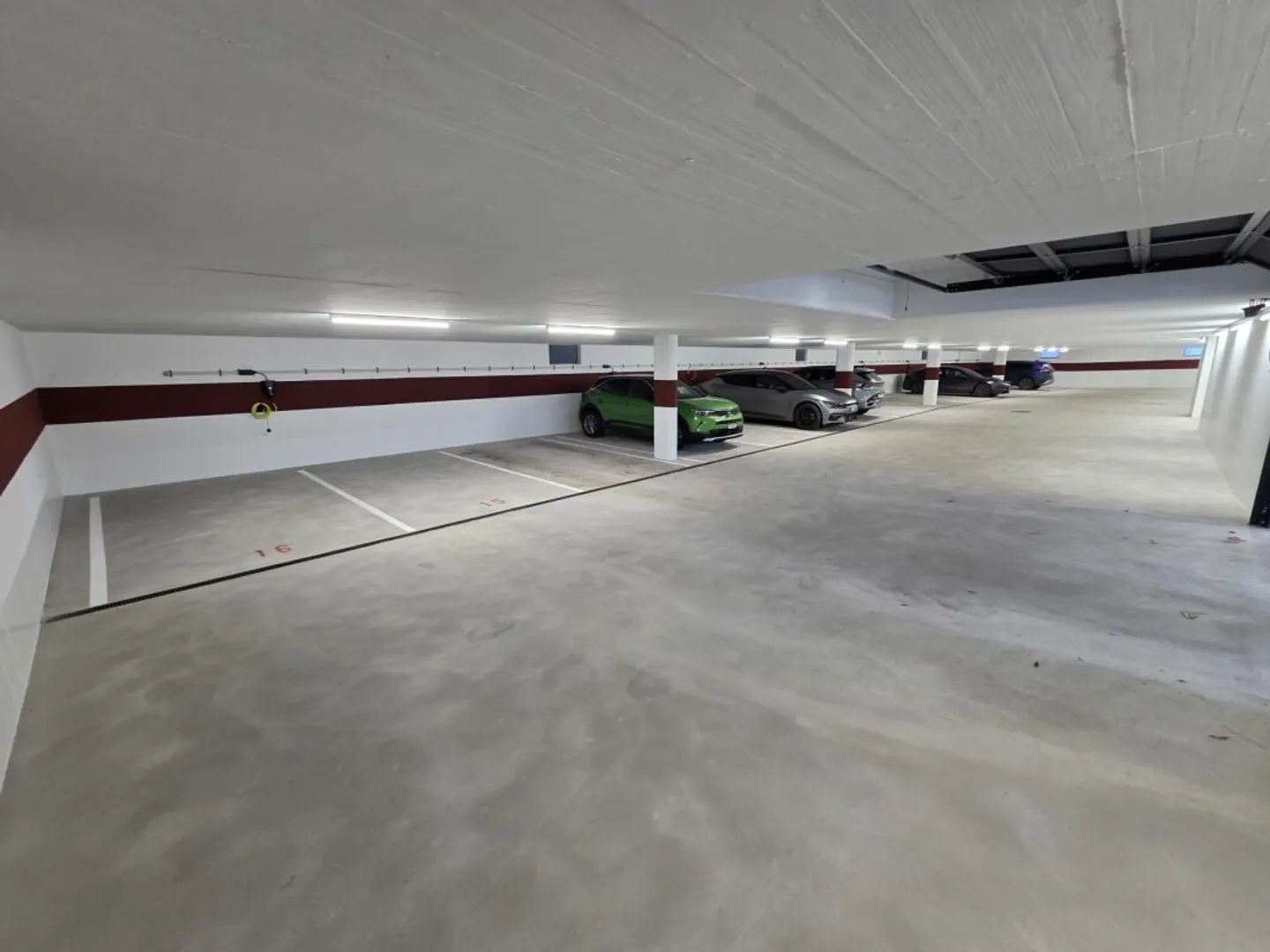 Parking spaces with and without charging station - Photo 1 of 5