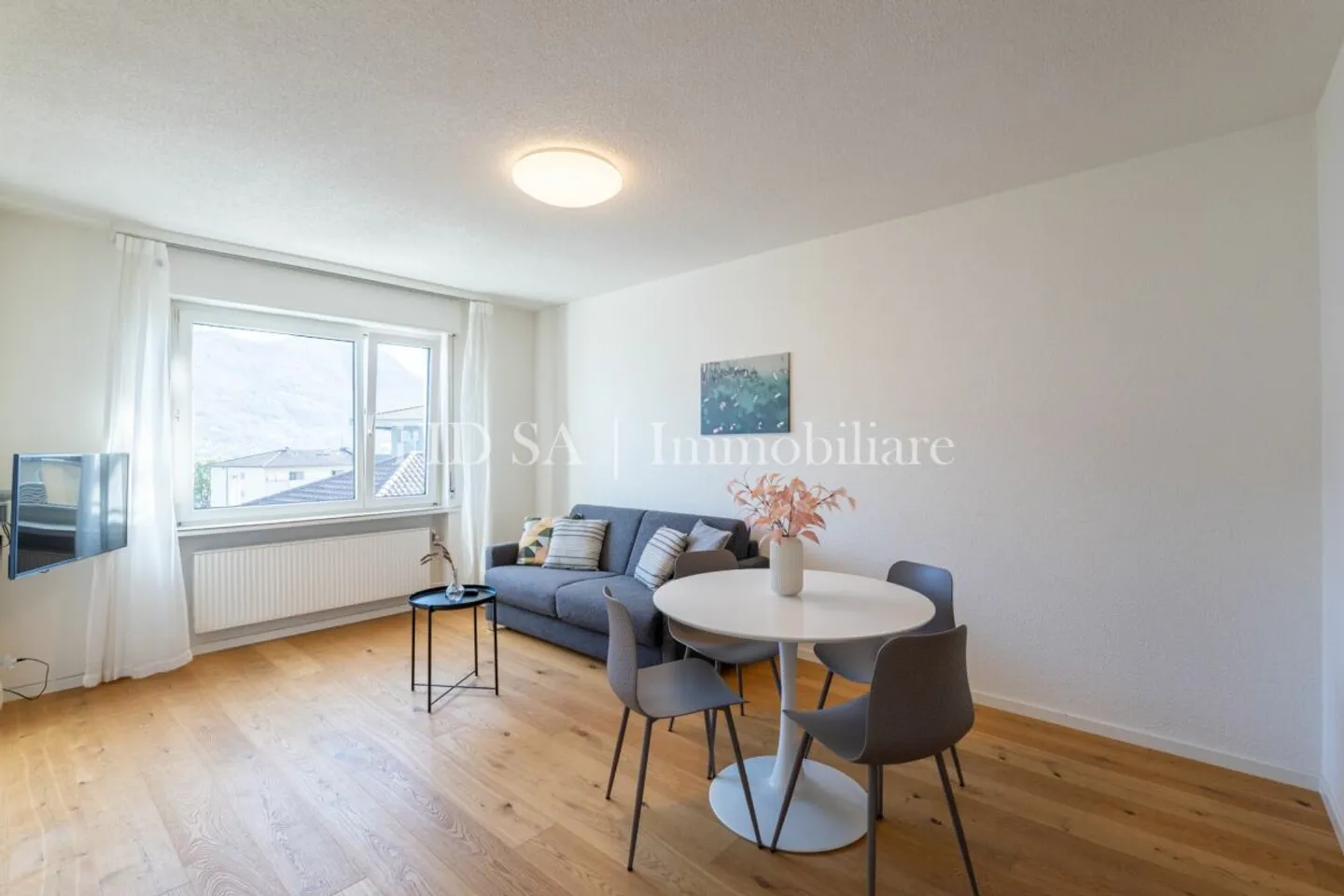 Charmante Wohnung mit Seesicht - Foto 2 von 7