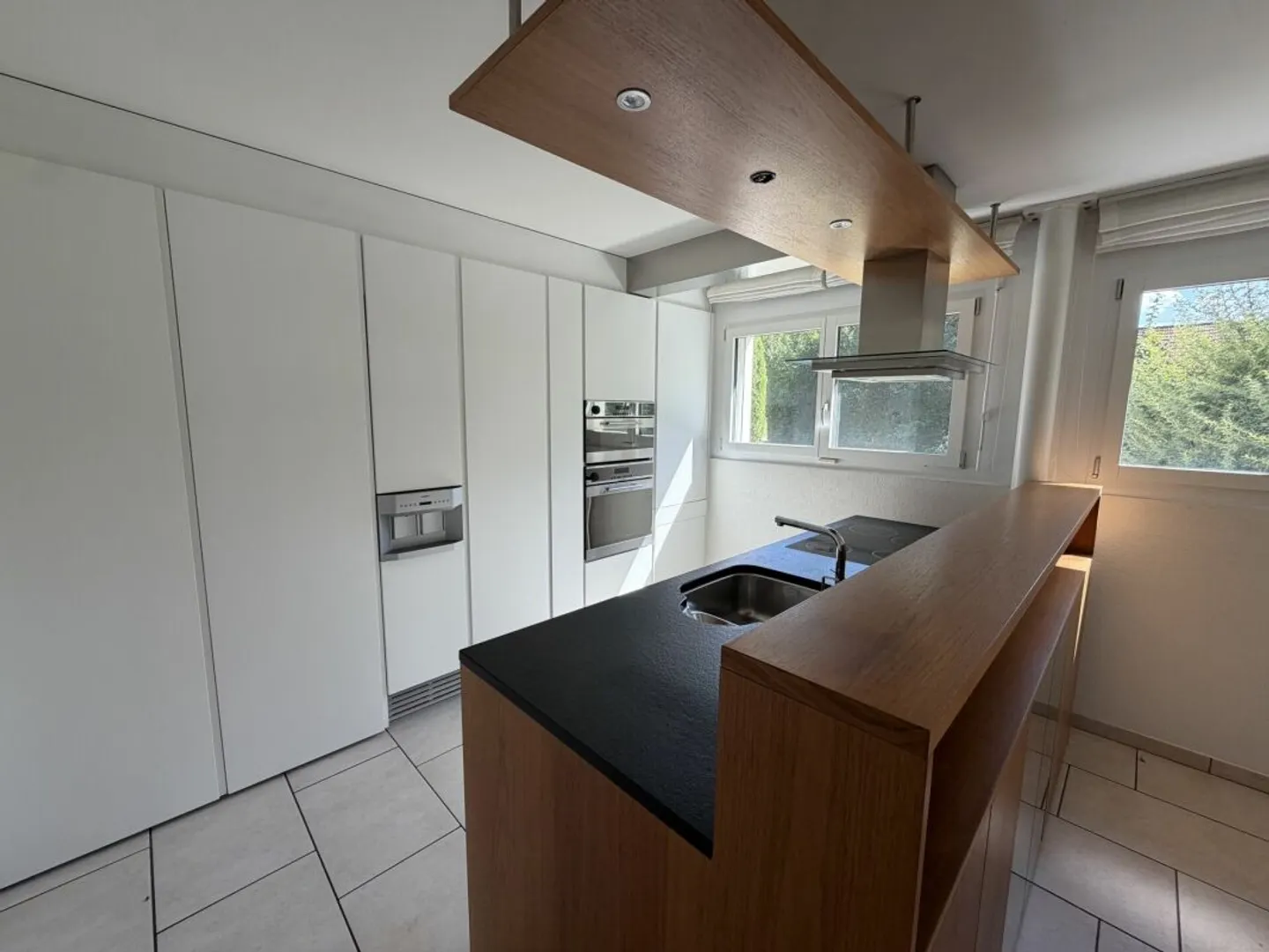 More Space than Usual: Spacious Family House in the Best Location in Bassersdorf - Photo 10 of 13