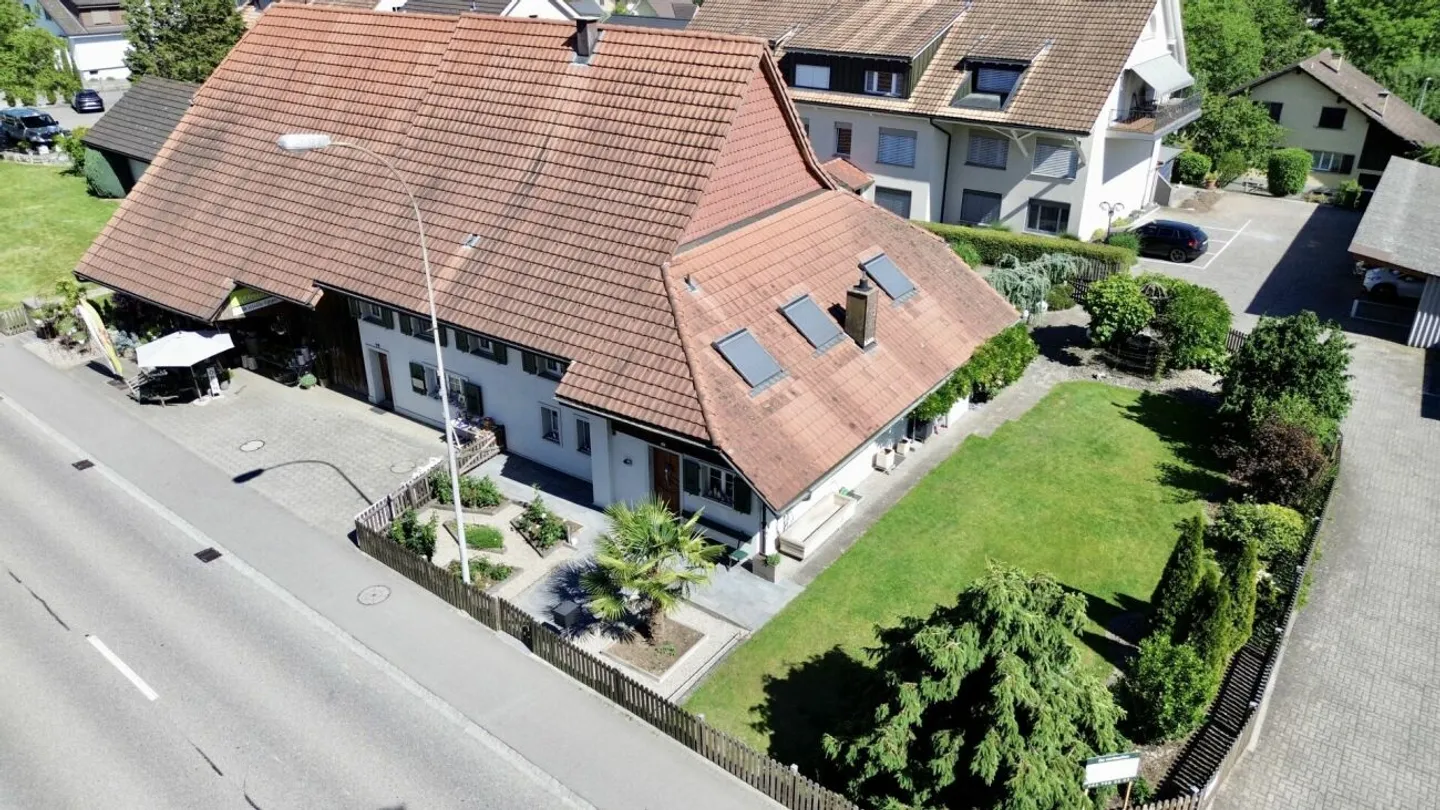 Unique property with commercial space, garden paradise, and expansion potential - Photo 4 of 13