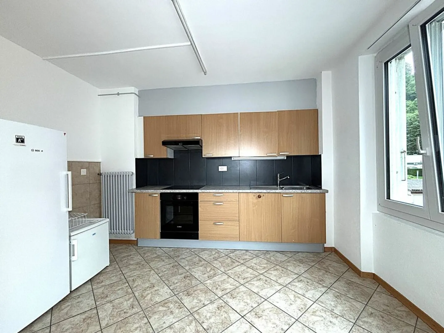 Charmant appartement 3 pièces avec balcon - Photo 2 sur 7
