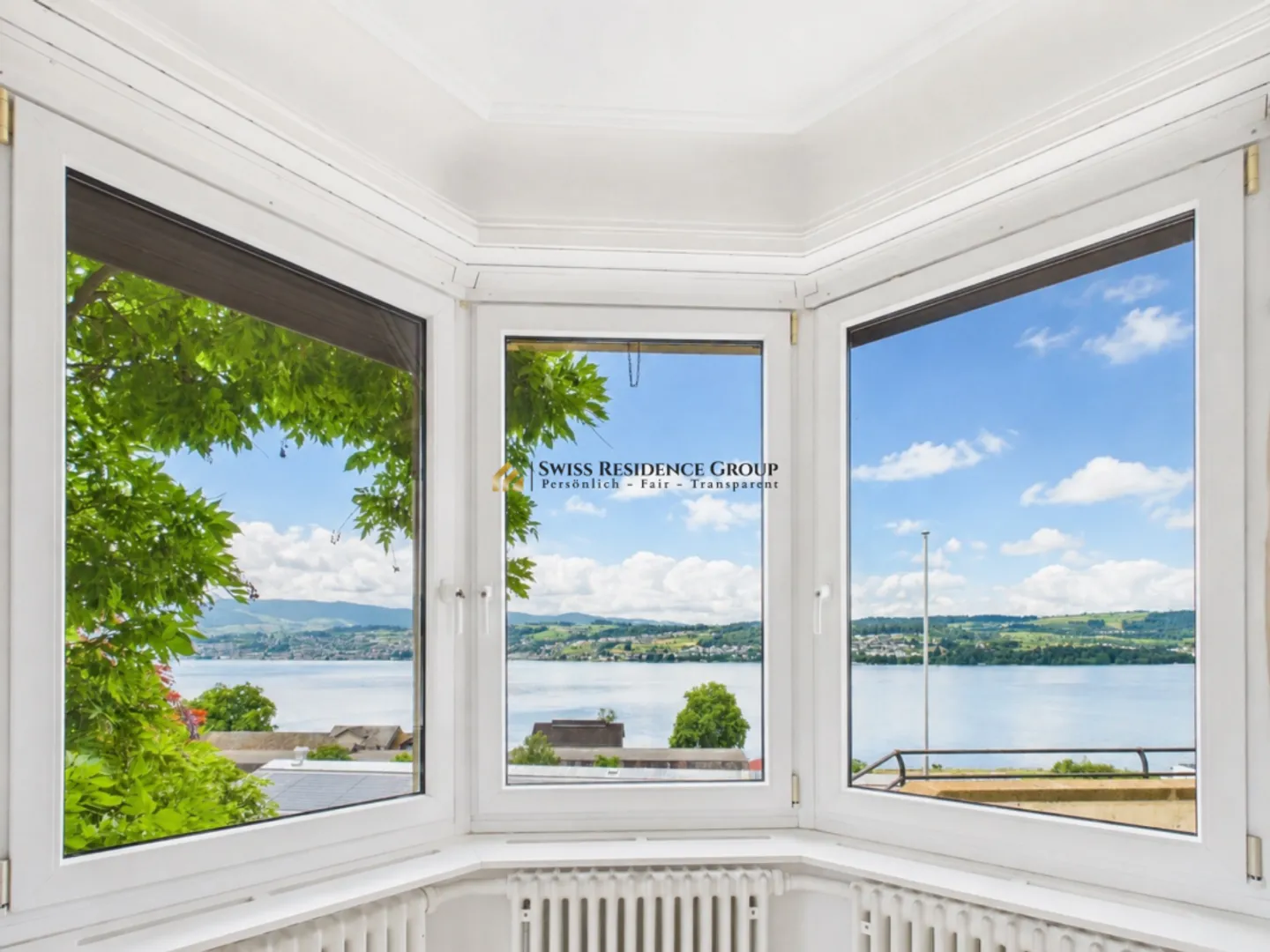 Maison individuelle charmante avec terrasses de jardin et vue imprenable sur le lac - Photo 1 sur 13