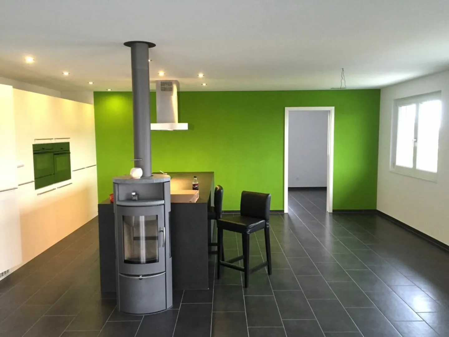Spacious commercial and residential property with workshop, gallery, and parking spaces - Photo 10 of 13