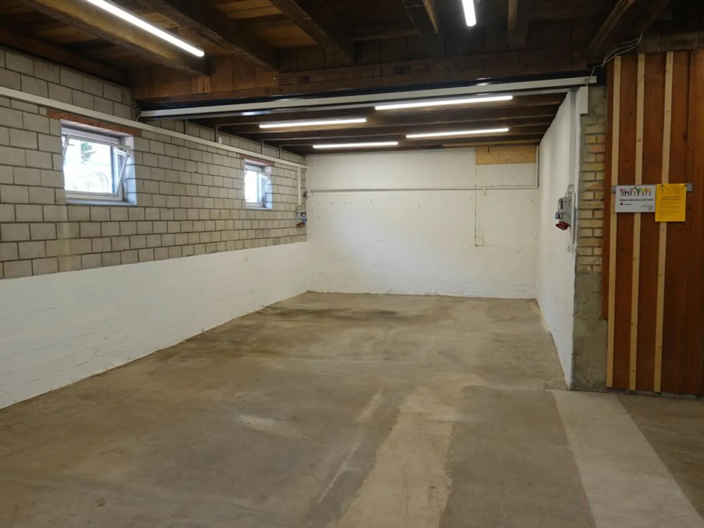 Ground-level, bright, practical commercial or storage space - Photo 2 of 3
