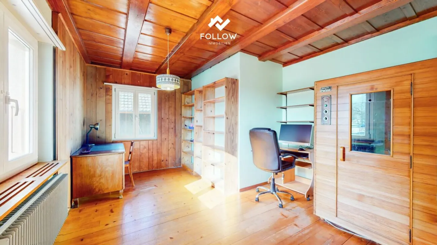 Vielseitiges Ein- oder Mehrfamilienhaus mit Baulandreserve Kopie - Foto 10 von 13