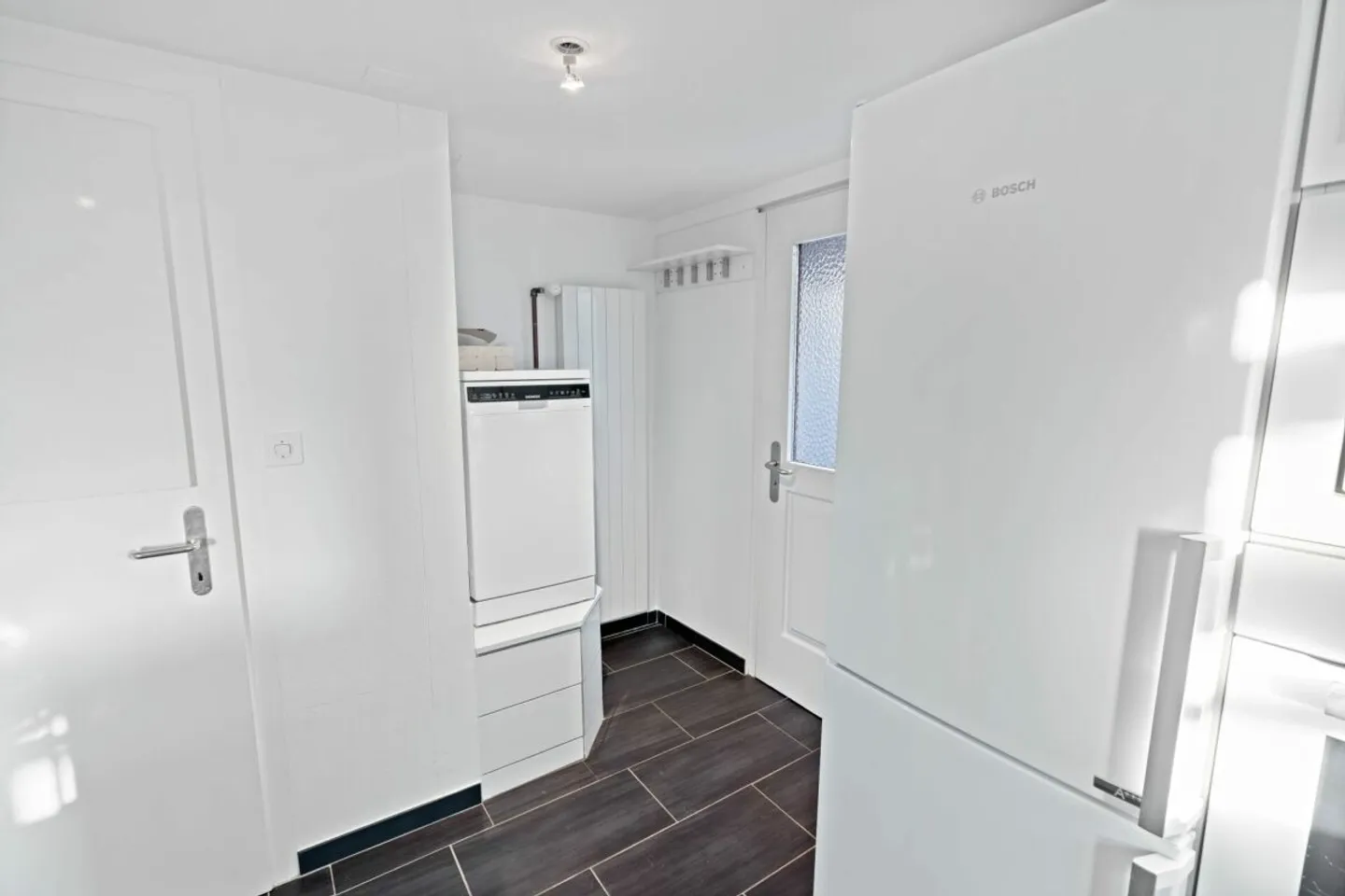 Tiny house urbano con giardino. Vivere in modo compatto a San Gallo - Foto 3 di 13