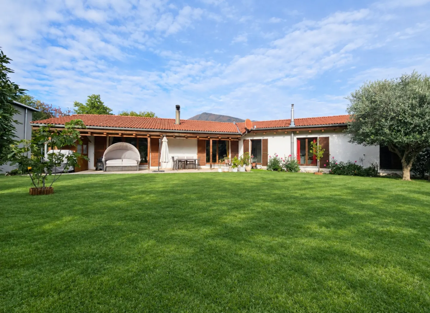EINFAMILIENHAUS MIT SCHÖNEM GARTEN IN CAPRIASCA - Foto 1 von 13