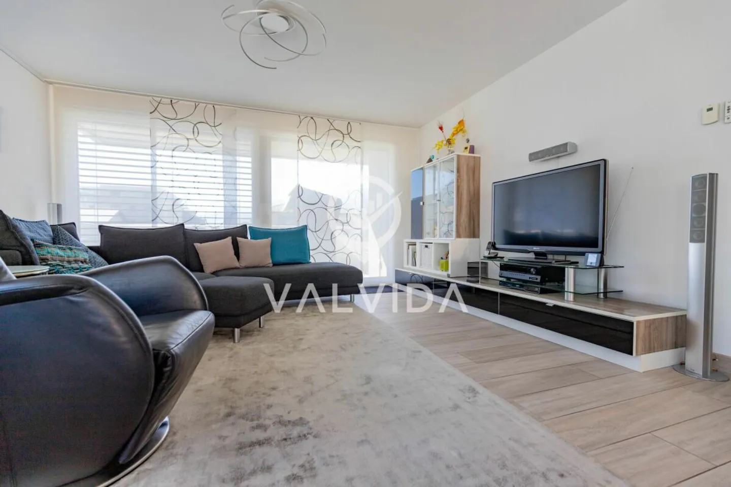 Moderne 5.5-Zimmerwohnung mit Wintergarten und hochwertiger Ausstattung - Foto 1 von 13