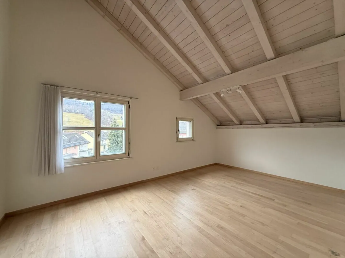 Penthouse spacieux de 3,5 pièces au centre de Buchs-Räfis - Photo 4 sur 9