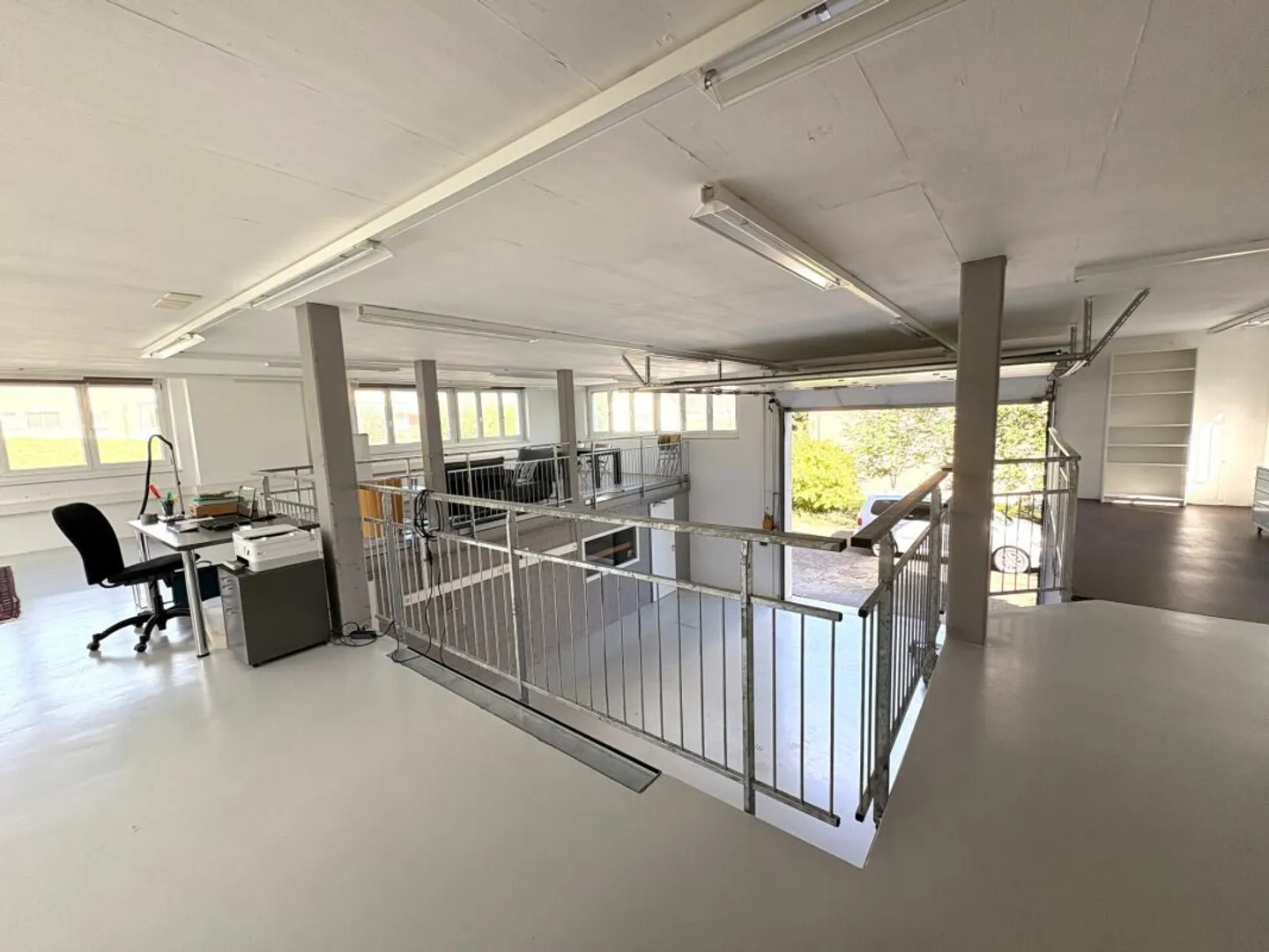 Spacious commercial and residential property with workshop, gallery, and parking spaces - Photo 7 of 13