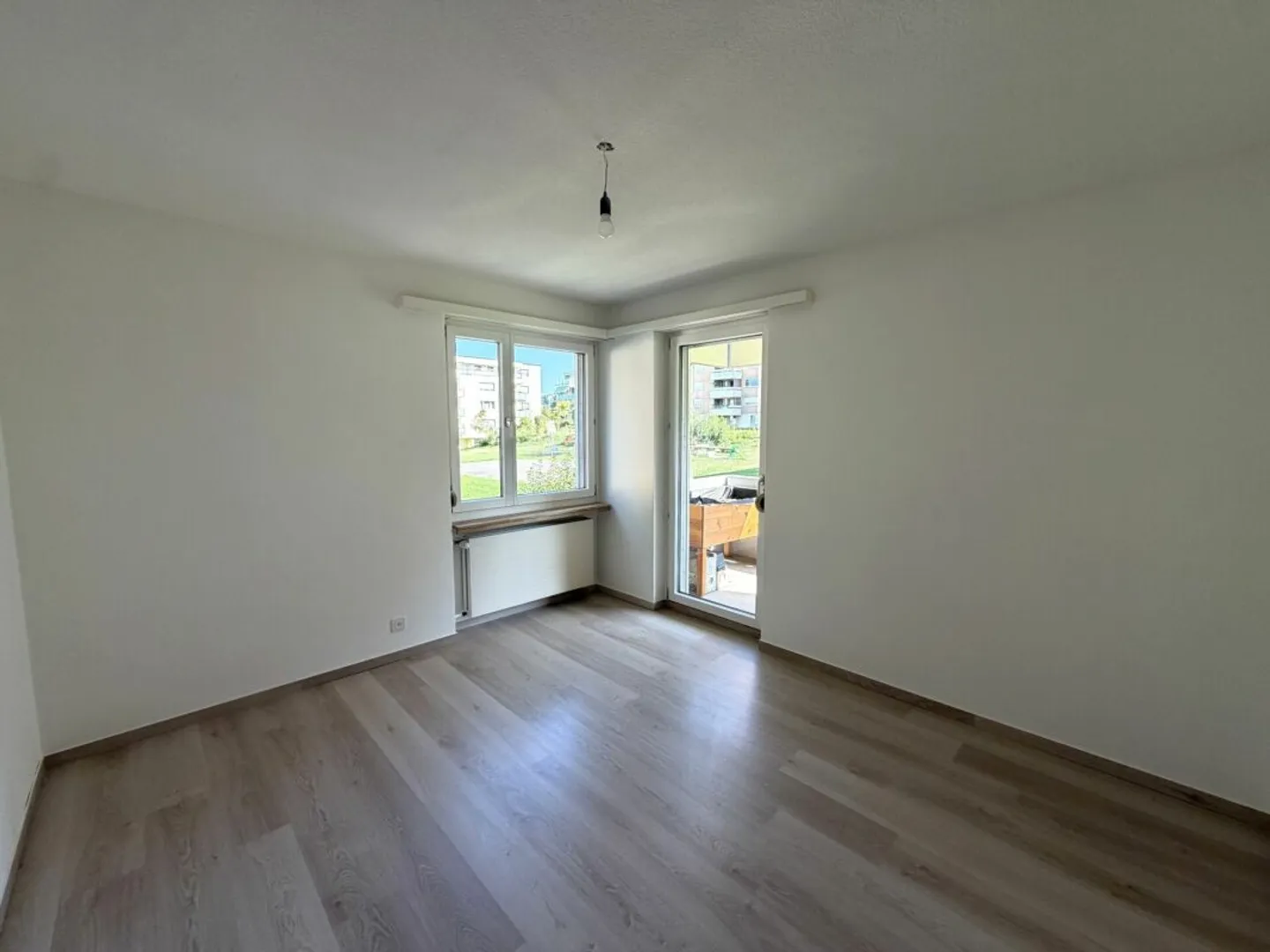 Cozy 3.5-room ground floor apartment with two balconies in a central location - Photo 9 of 13