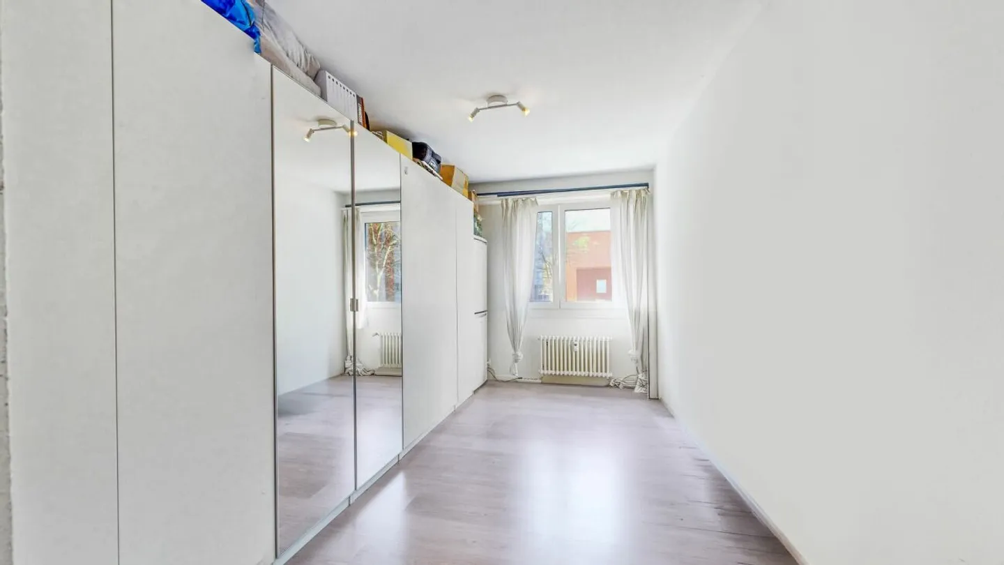 Appartement bien entretenu avec balcon, cave, grenier et place de parking - Photo 13 sur 13