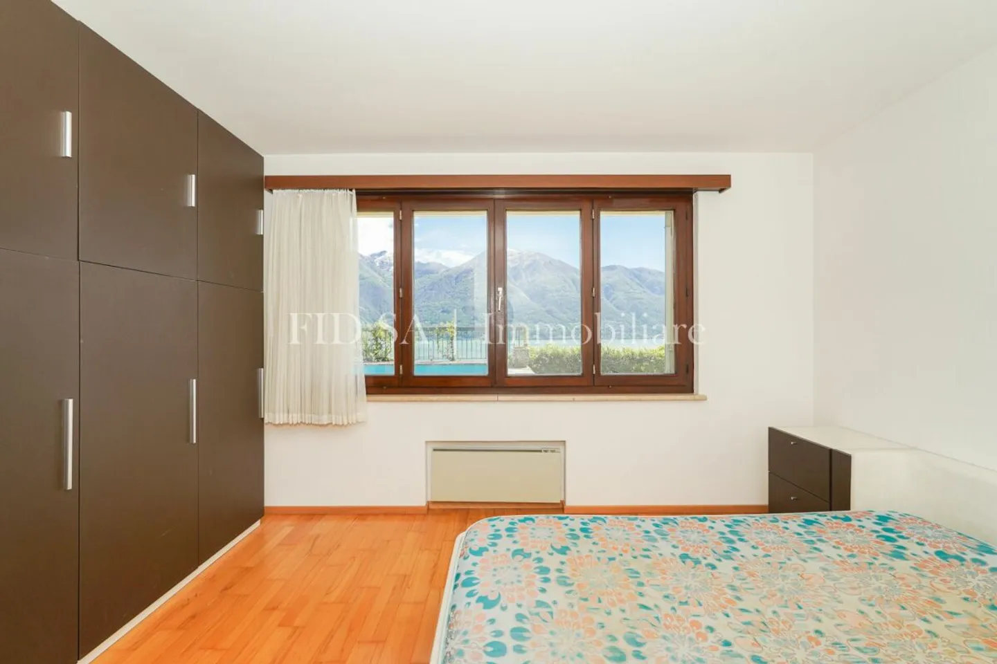 MINUSIO - Maison bifamiliale spacieuse avec un grand potentiel et une vue magnifique - Photo 11 sur 12