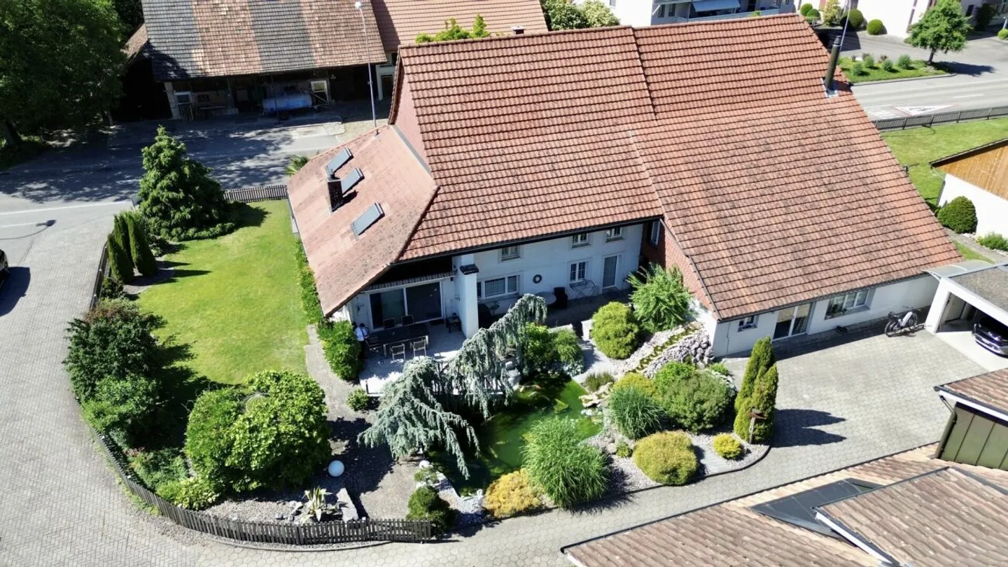 Unique property with commercial space, garden paradise, and expansion potential - Photo 2 of 13