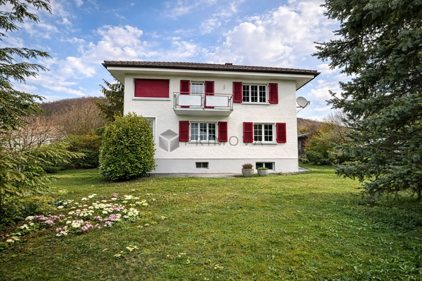 Charming two-family house with idyllic outdoor area and land reserve - Photo 1 of 3