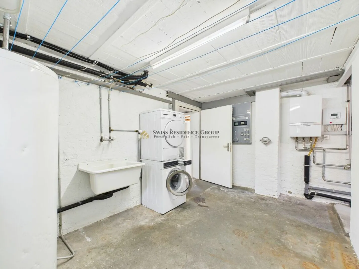 Vielfältiges Einfamilienhaus mit Gewerbemöglichkeit und Autolift - Foto 8 von 12