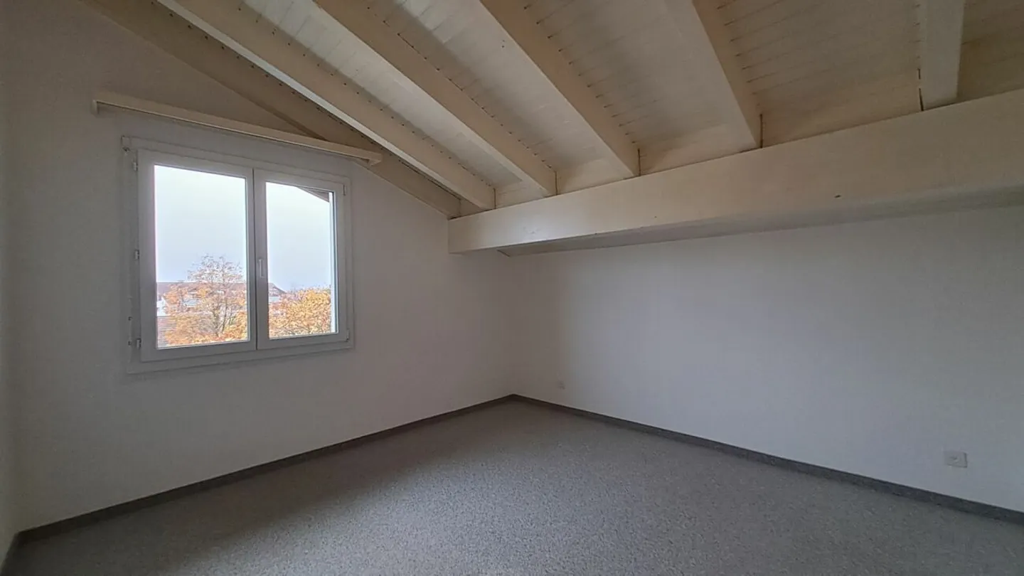 Charmante Dachwohnung mit Aussicht - Foto 7 von 11