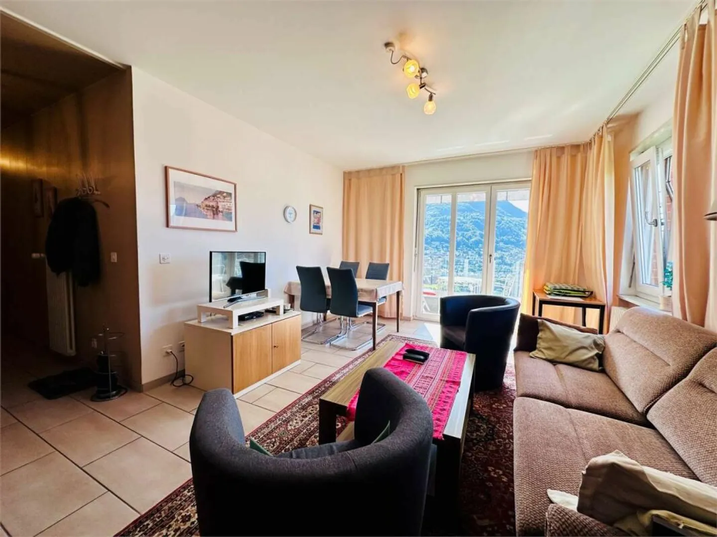 Sonnige 3.5 Zimmer Wohnung mit Balkon &amp; Seesicht in Porza - Foto 3 von 12