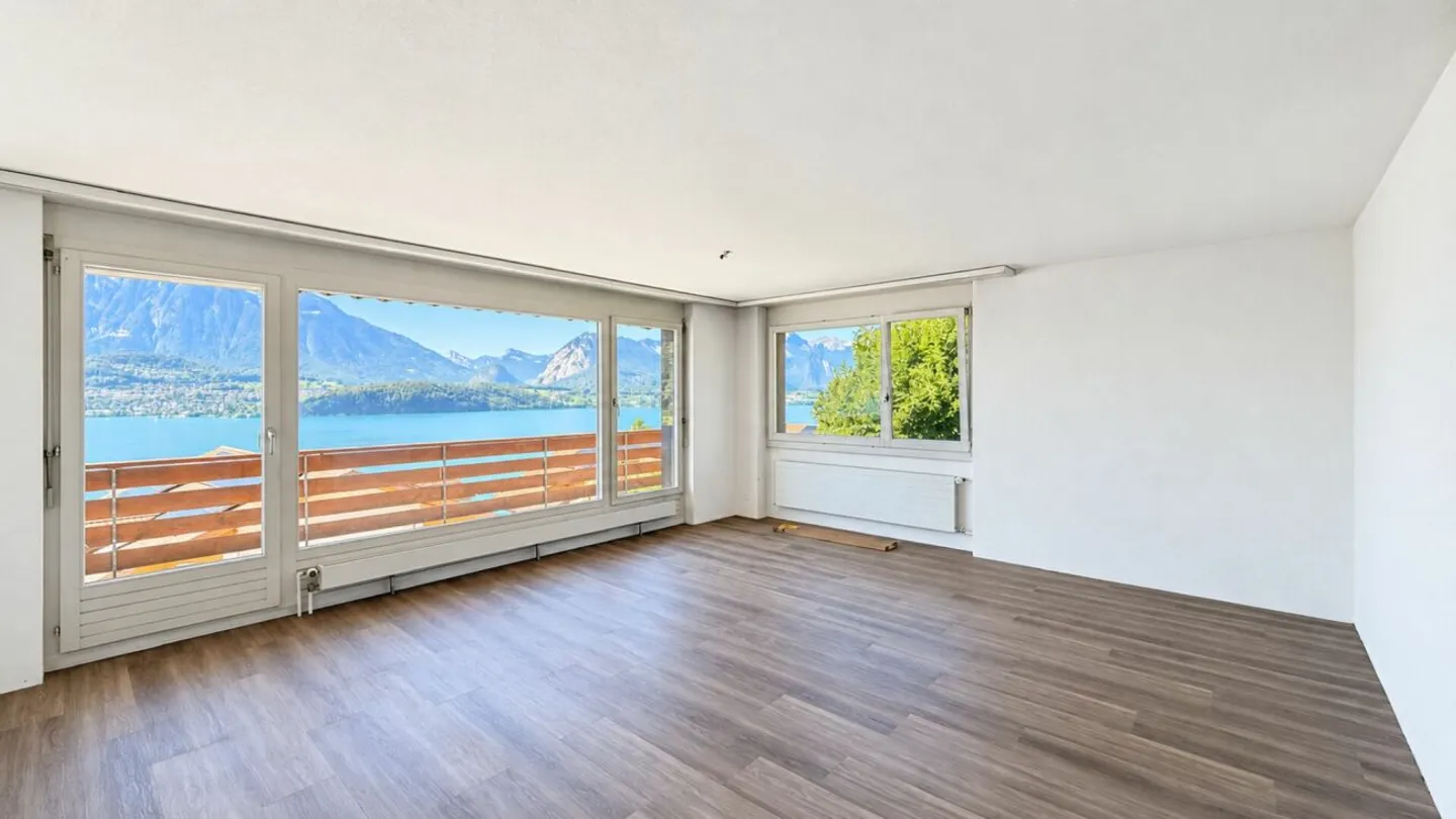 Vivre avec vue sur le lac et la montagne - 3½ pièces avec grand balcon à Gunten - Photo 5 sur 13