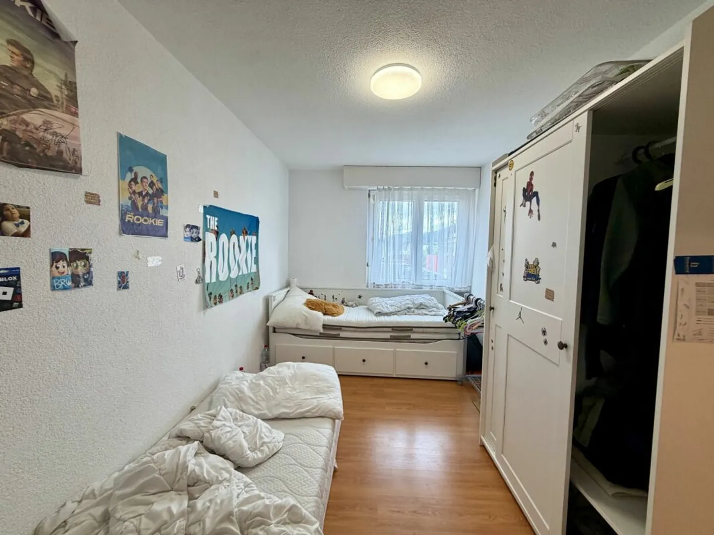 Appartement lumineux de 4,5 pièces dans un quartier familial - Photo 9 sur 12