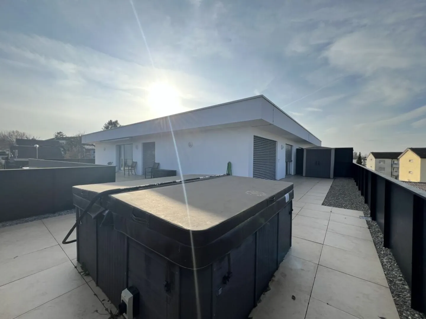 Above the rooftops of Arbon: Penthouse apartment with sunny roof terrace and lake view - Photo 1 of 13