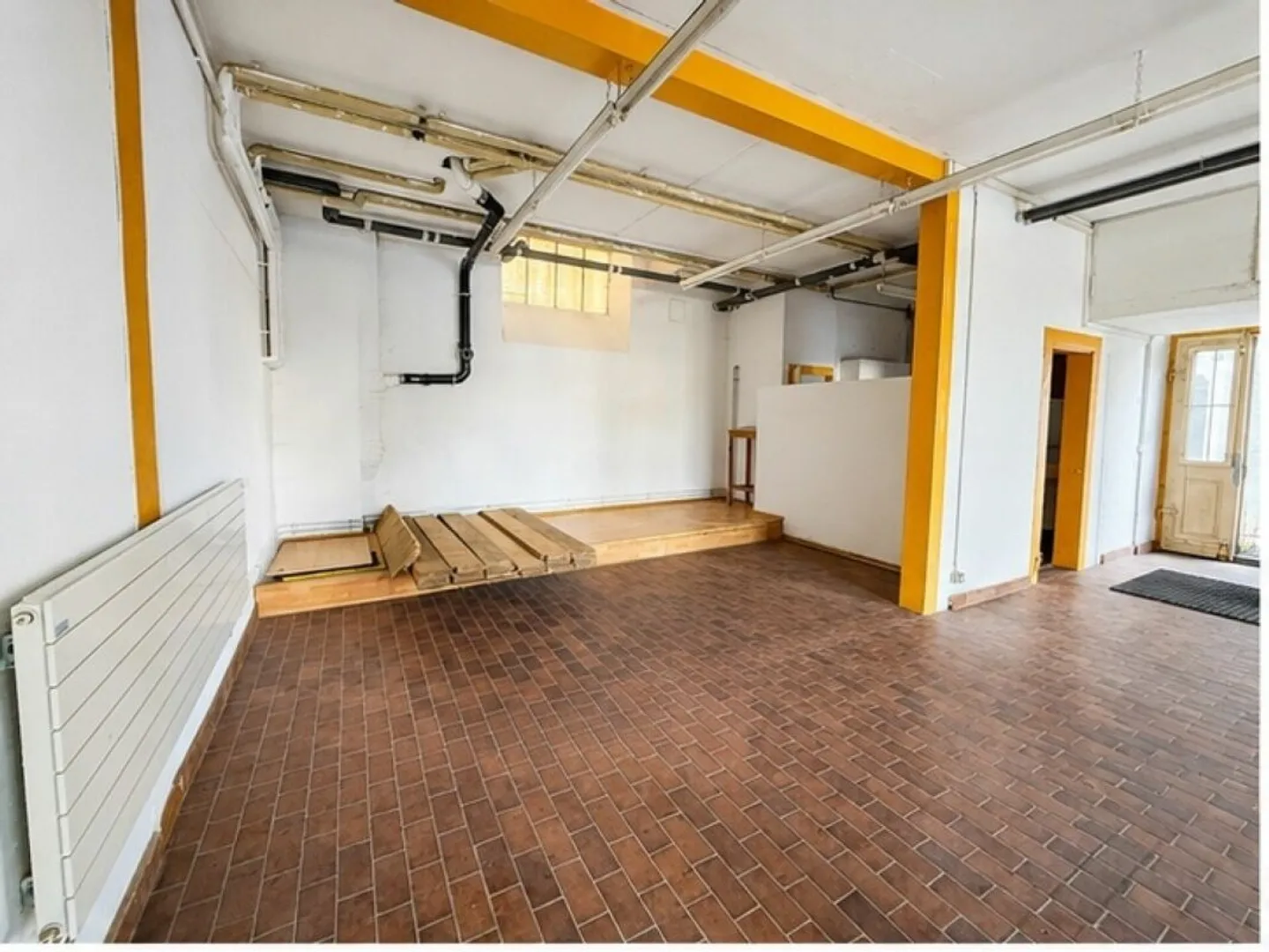 Versatile commercial space with storage area - Photo 1 of 8