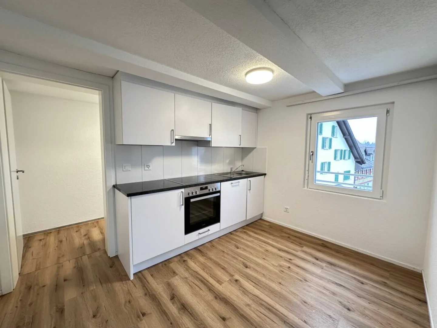 Appartement 2.5 pièces - Photo 6 sur 8