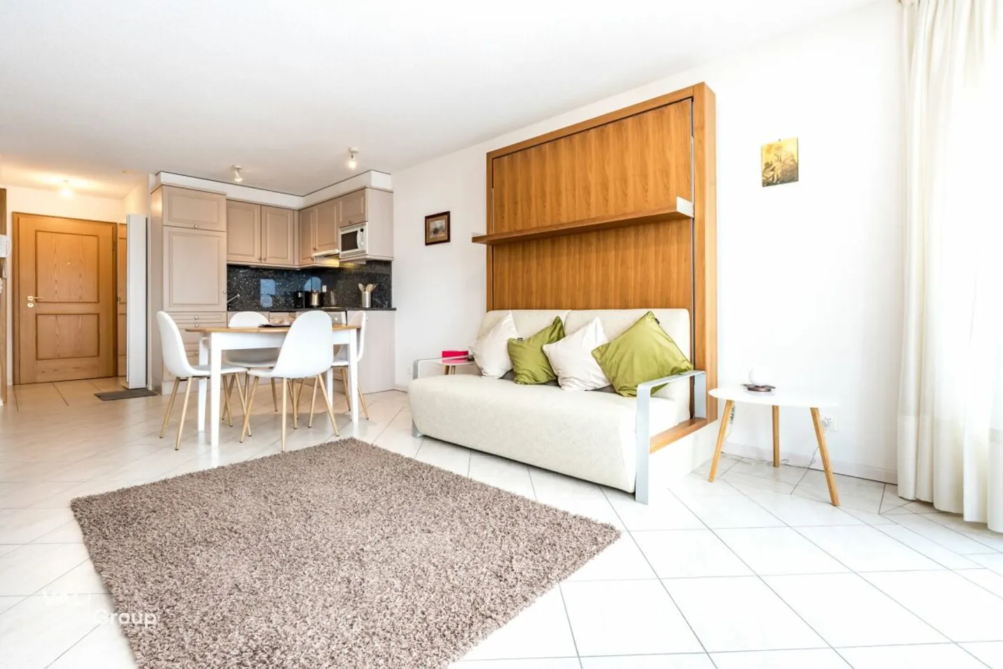 Small, fine & profitable - Studio with underground parking - Photo 3 of 9