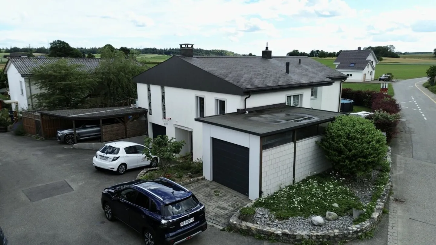 A House, Two Possibilities - Family Paradise with Potential - Photo 12 of 13