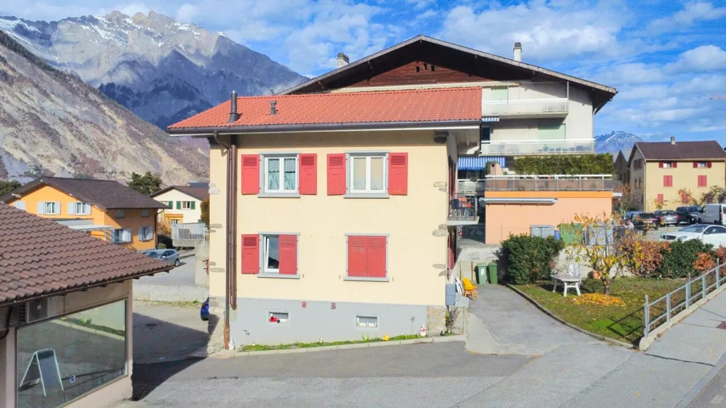 Maison multi-appartements avec local commercial - Photo 3 sur 7