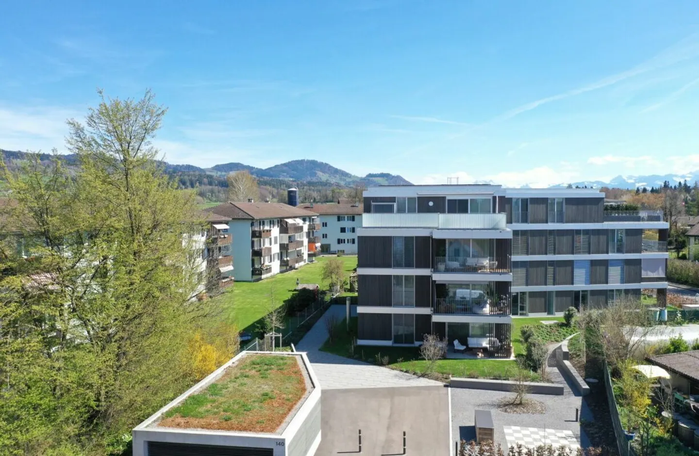 Appartamento giardino 4,5 locali elegante in costruzione ibrida in legno nobile - Foto 1 di 13