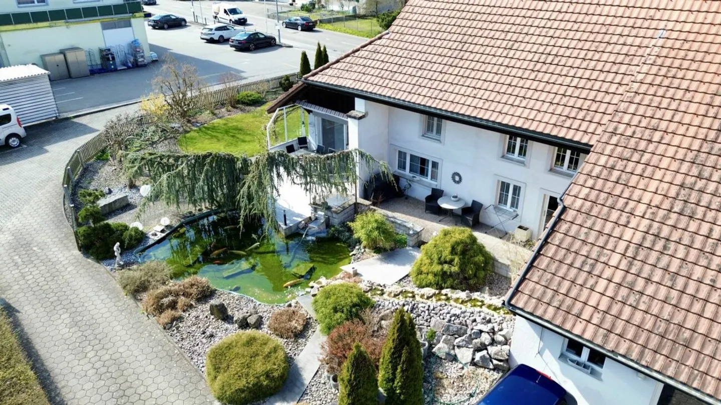 Historical Jewel with Koi Pond, Garden & Versatile Use - Photo 3 of 13