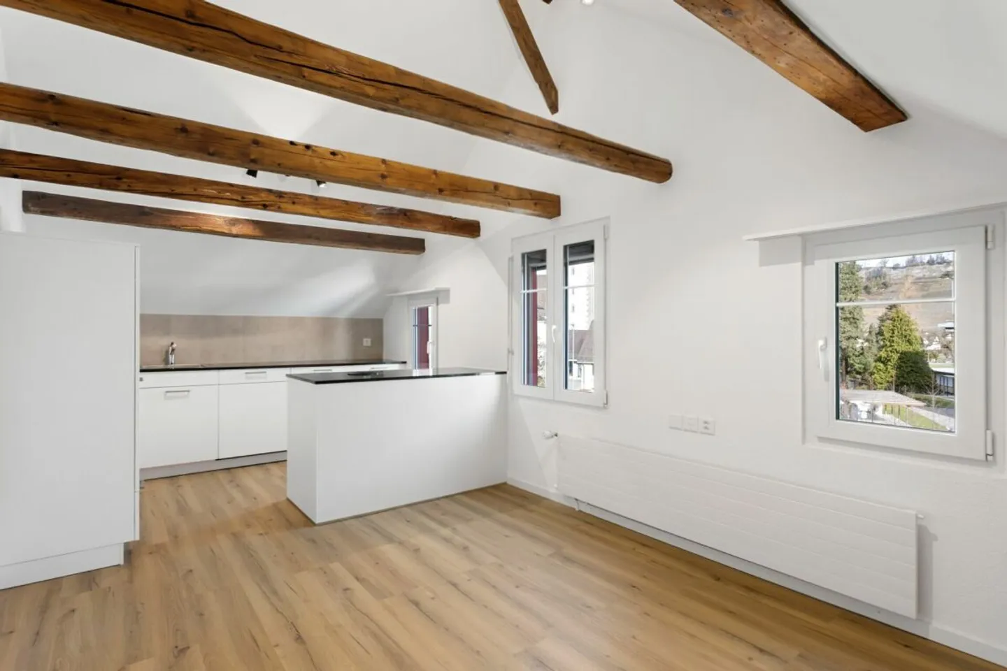 2.5-room designer apartment with kitchen island - Photo 1 of 11