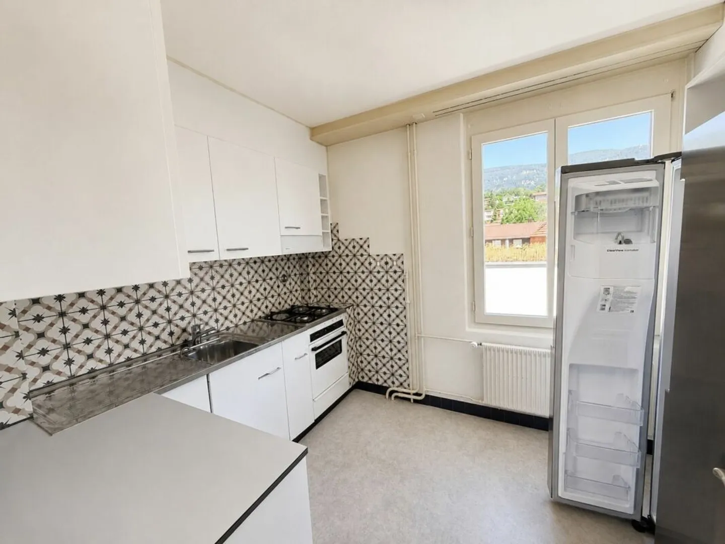 Multi-family house with 4 residential units in a central location in Bellach - Photo 3 of 13